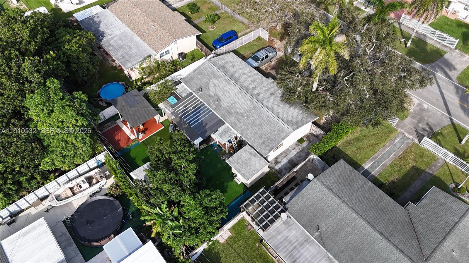 14800 Southwest 296th Street Homestead, FL 33033 - Photo 6 of 28 an aerial view of a house with outdoor space and street view