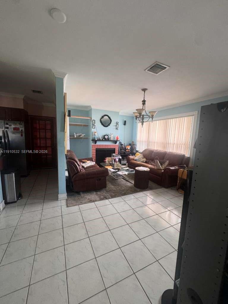 14800 Southwest 296th Street Homestead, FL 33033 - Photo 10 of 28 a living room with furniture and a window