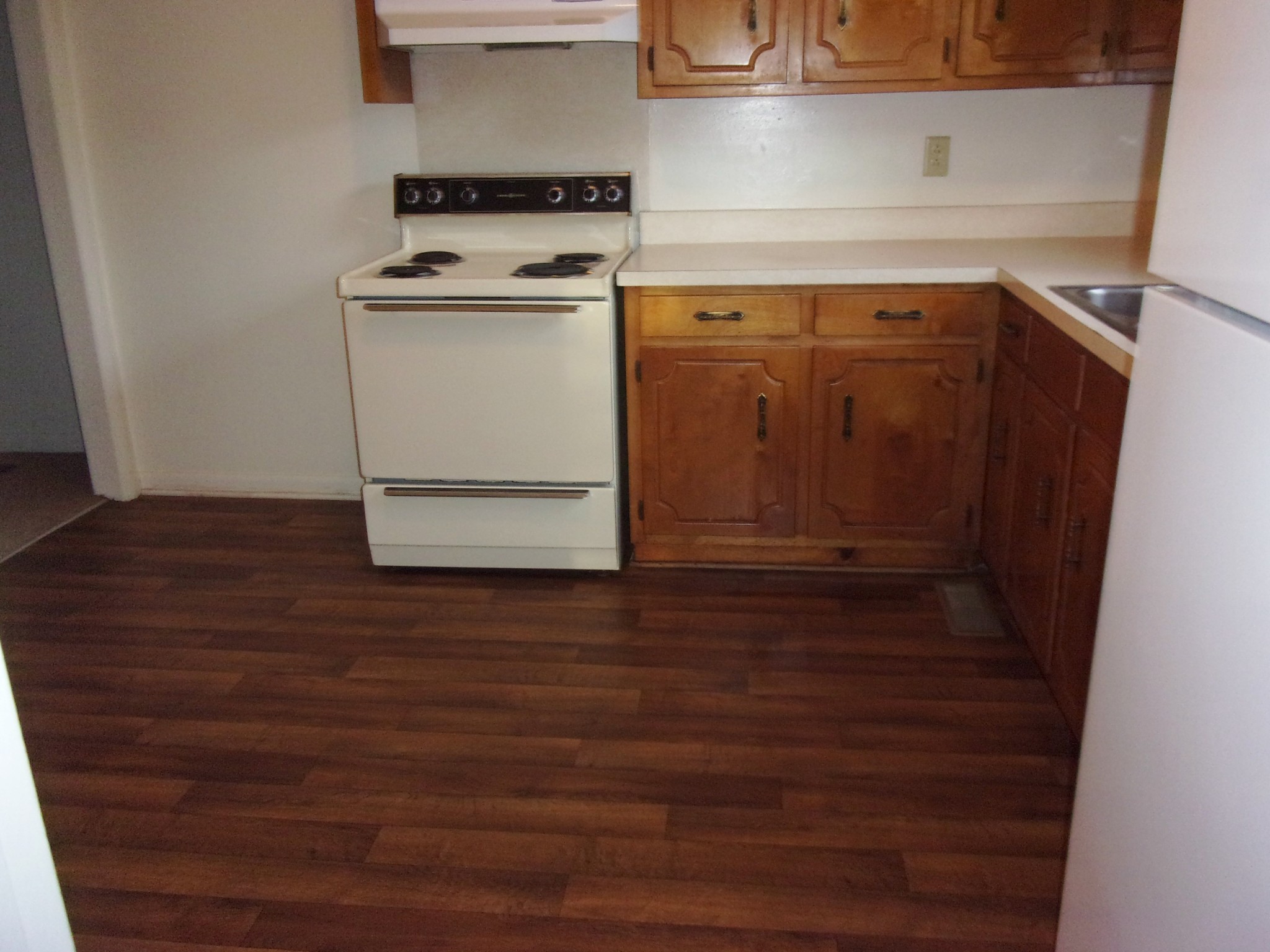 131 Quita Circle, Unit B Lebanon, TN 37087 - Photo 3 of 6 a utility room with wooden floor washer and dryer