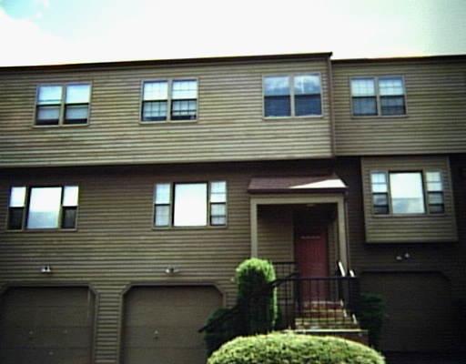 11 Westport Road, Unit 29 Wilton, CT 06897 - Photo 1 of 1 a front view of a house