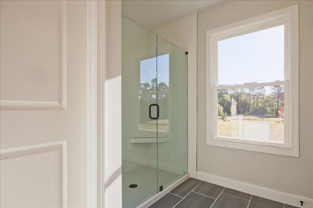313 Colsen Drive Acworth, GA 30102 - Photo 33 of 37 a bathroom with a shower