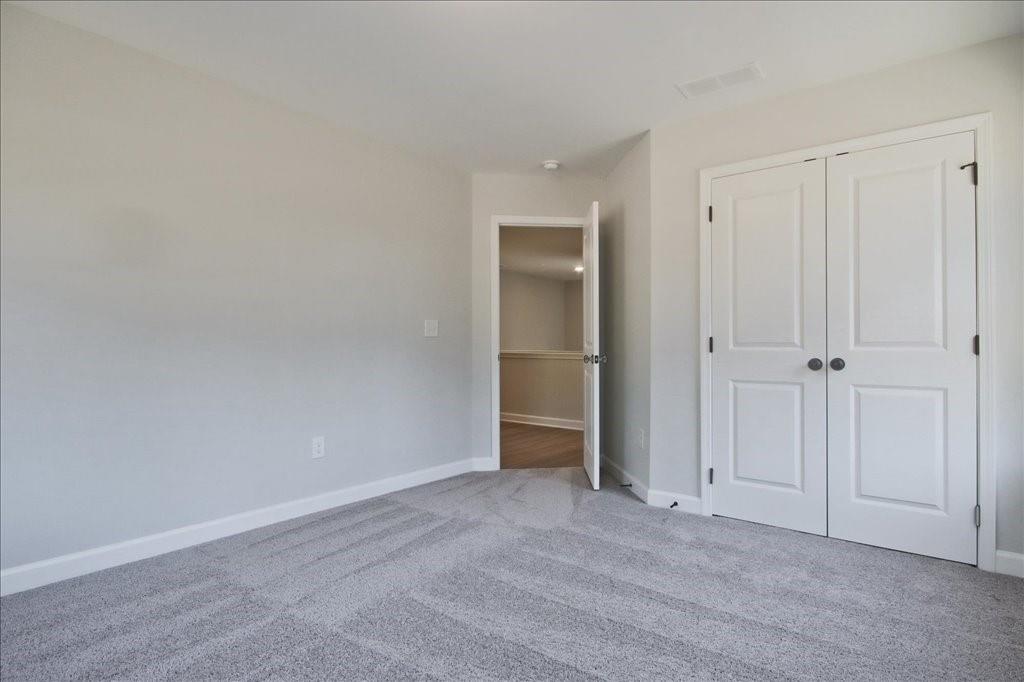 313 Colsen Drive Acworth, GA 30102 - Photo 35 of 37 a view of an empty room and closet area