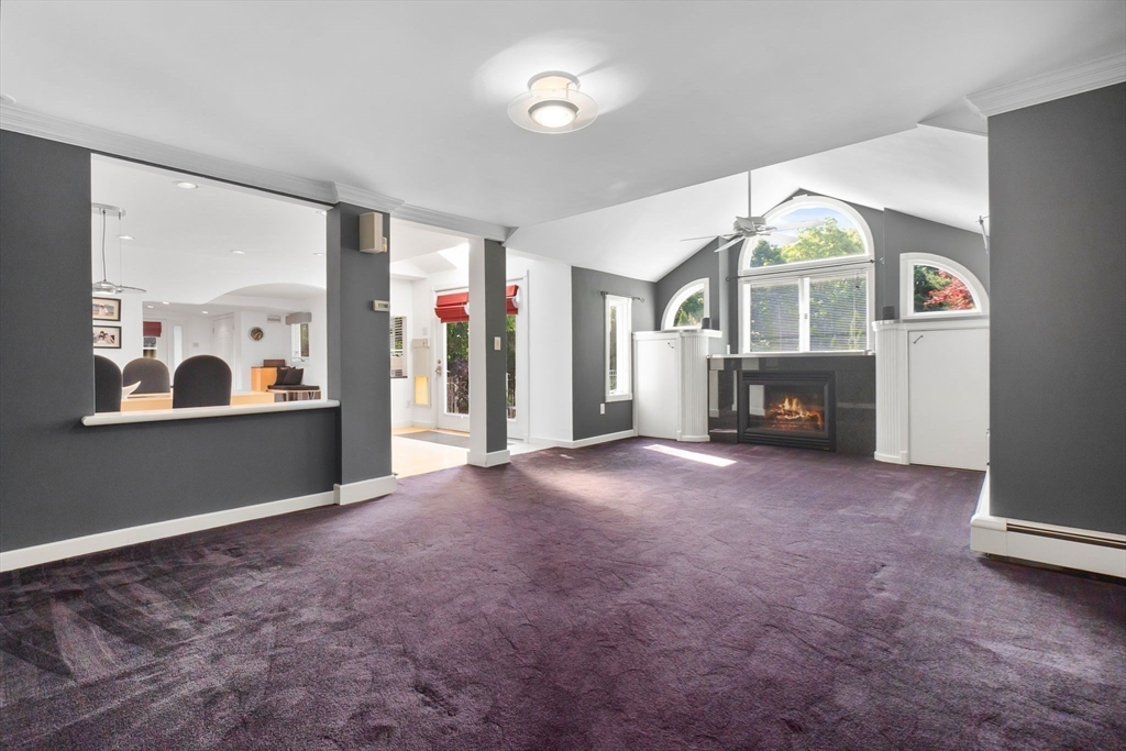 11 Bartlett Place Amesbury, MA 01913 - Photo 16 of 41 a view of livingroom with furniture and a fireplace