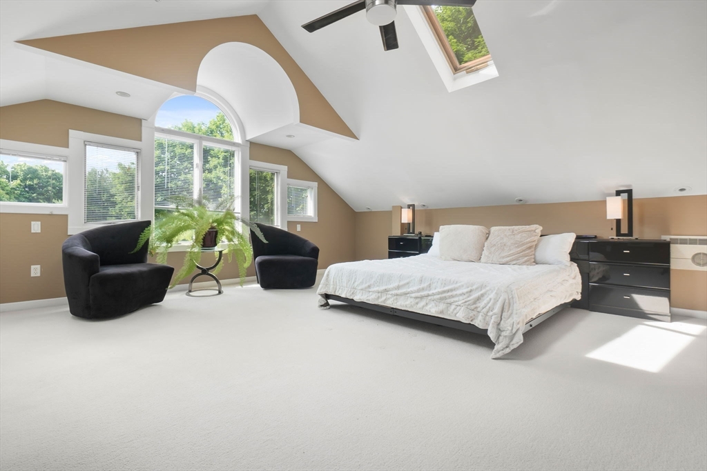 11 Bartlett Place Amesbury, MA 01913 - Photo 17 of 41 a spacious bedroom with bed and a large window