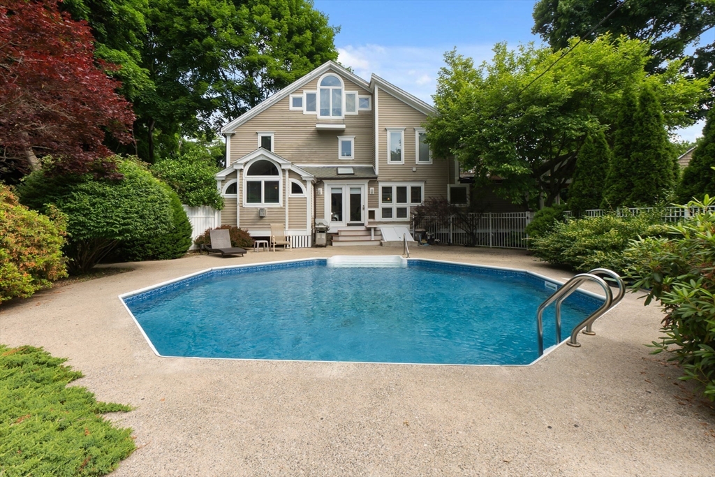 11 Bartlett Place Amesbury, MA 01913 - Photo 2 of 41 a front view of a house with a yard