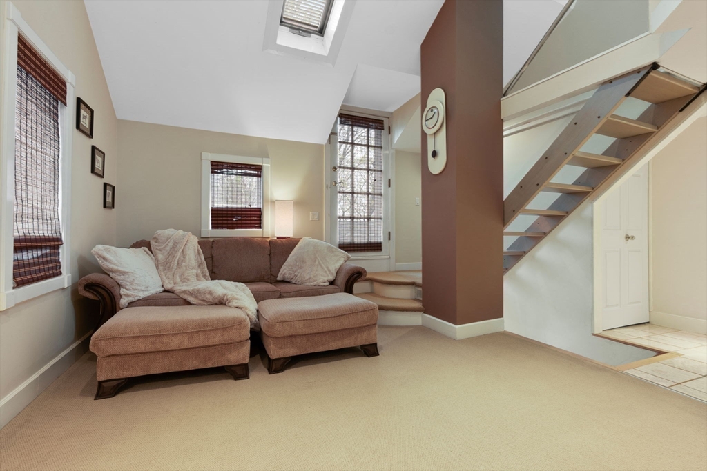 11 Bartlett Place Amesbury, MA 01913 - Photo 25 of 41 a living room with furniture and a window