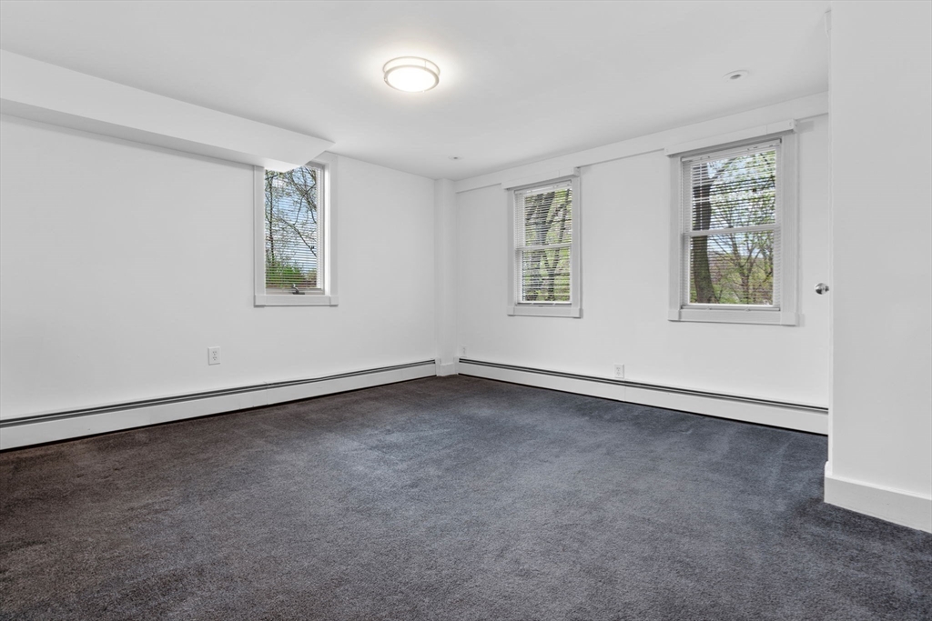 11 Bartlett Place Amesbury, MA 01913 - Photo 30 of 41 an empty room with a window