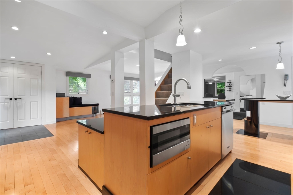 11 Bartlett Place Amesbury, MA 01913 - Photo 3 of 41 a kitchen with stainless steel appliances granite countertop a stove a sink and a refrigerator