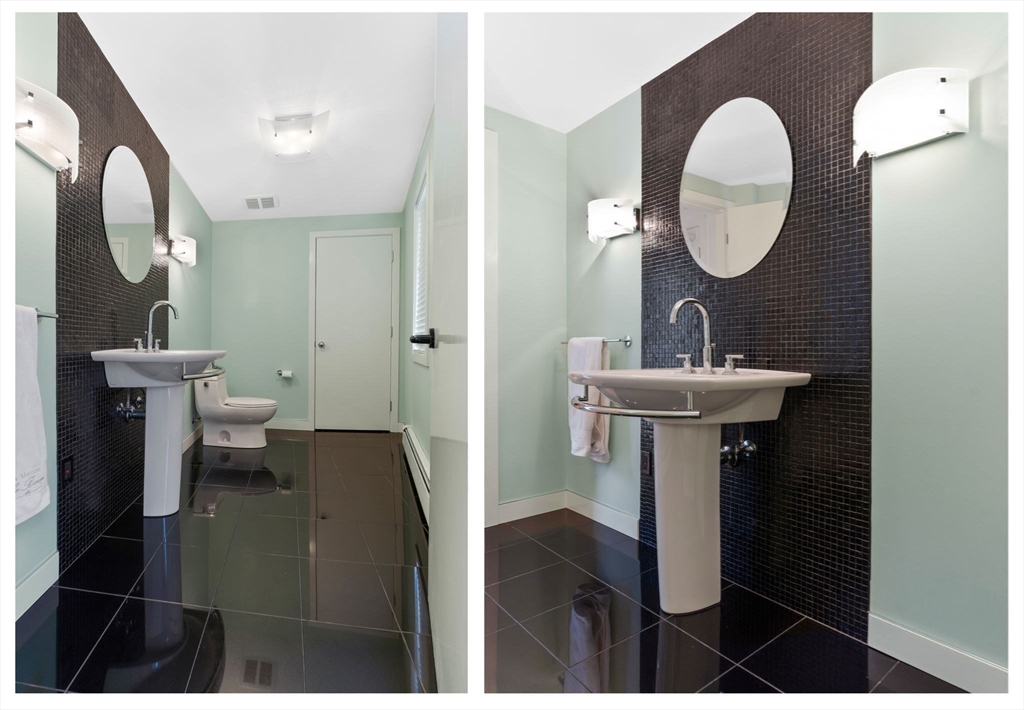 11 Bartlett Place Amesbury, MA 01913 - Photo 33 of 41 a bathroom with a sink and a mirror