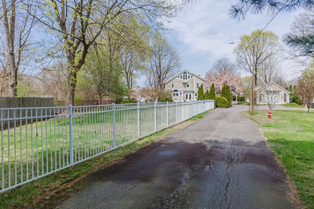 11 Bartlett Place Amesbury, MA 01913 - Photo 36 of 41 a view of a park with iron fence