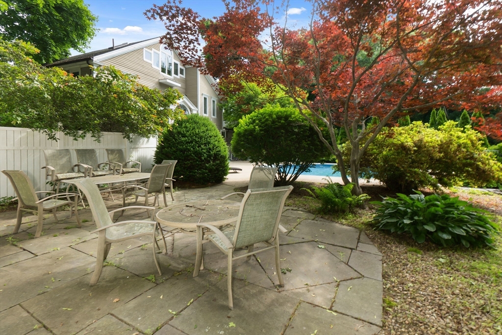 11 Bartlett Place Amesbury, MA 01913 - Photo 41 of 41 a table and chairs in a patio