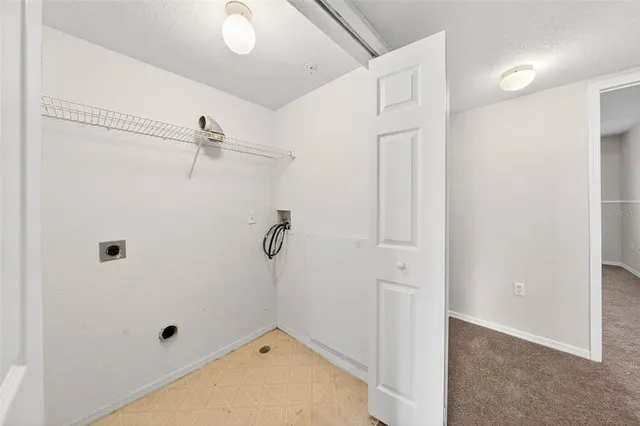 a view of a backyard with sitting area