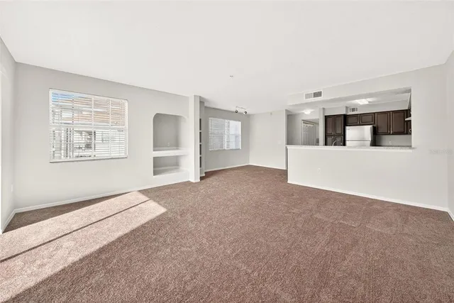 a view of a balcony with a floor to ceiling window