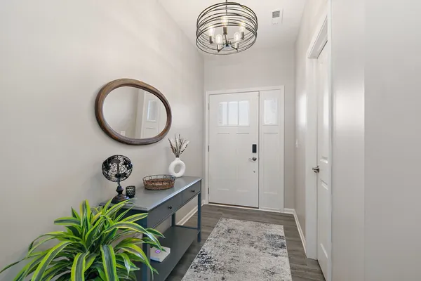 a view of a storage and utility room with a sink