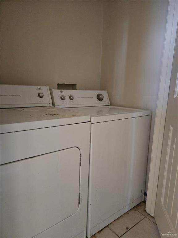 3704 South Wyndham Avenue, Unit D Pharr, TX 78577 - Photo 11 of 11 a close up view of washer and dryer