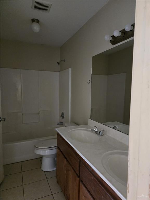 3704 South Wyndham Avenue, Unit D Pharr, TX 78577 - Photo 4 of 11 a bathroom with a sink and a mirror