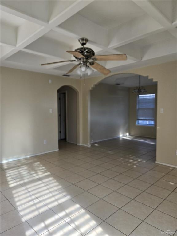 3704 South Wyndham Avenue, Unit D Pharr, TX 78577 - Photo 6 of 11 a view of a livingroom with a ceiling fan and entryway