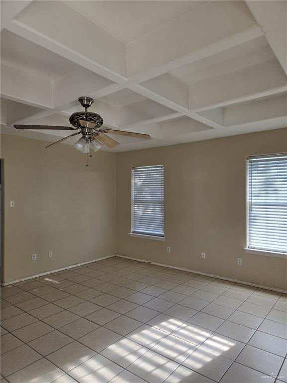 3704 South Wyndham Avenue, Unit D Pharr, TX 78577 - Photo 7 of 11 a view of an empty room and a window