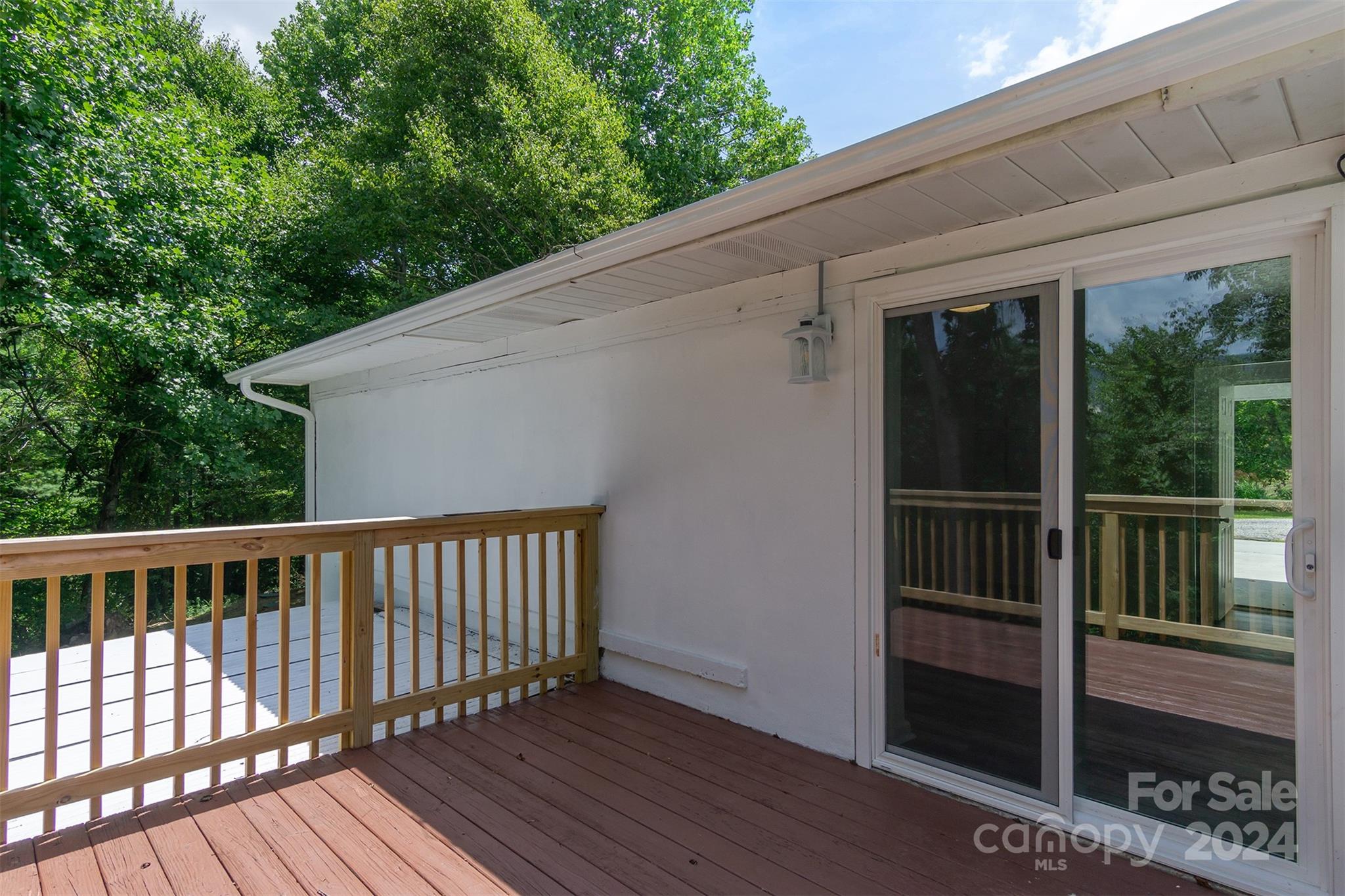 468 Deer Park Lake Road Spruce Pine, NC 28777 - Photo 11 of 46 a view of balcony with wooden floor