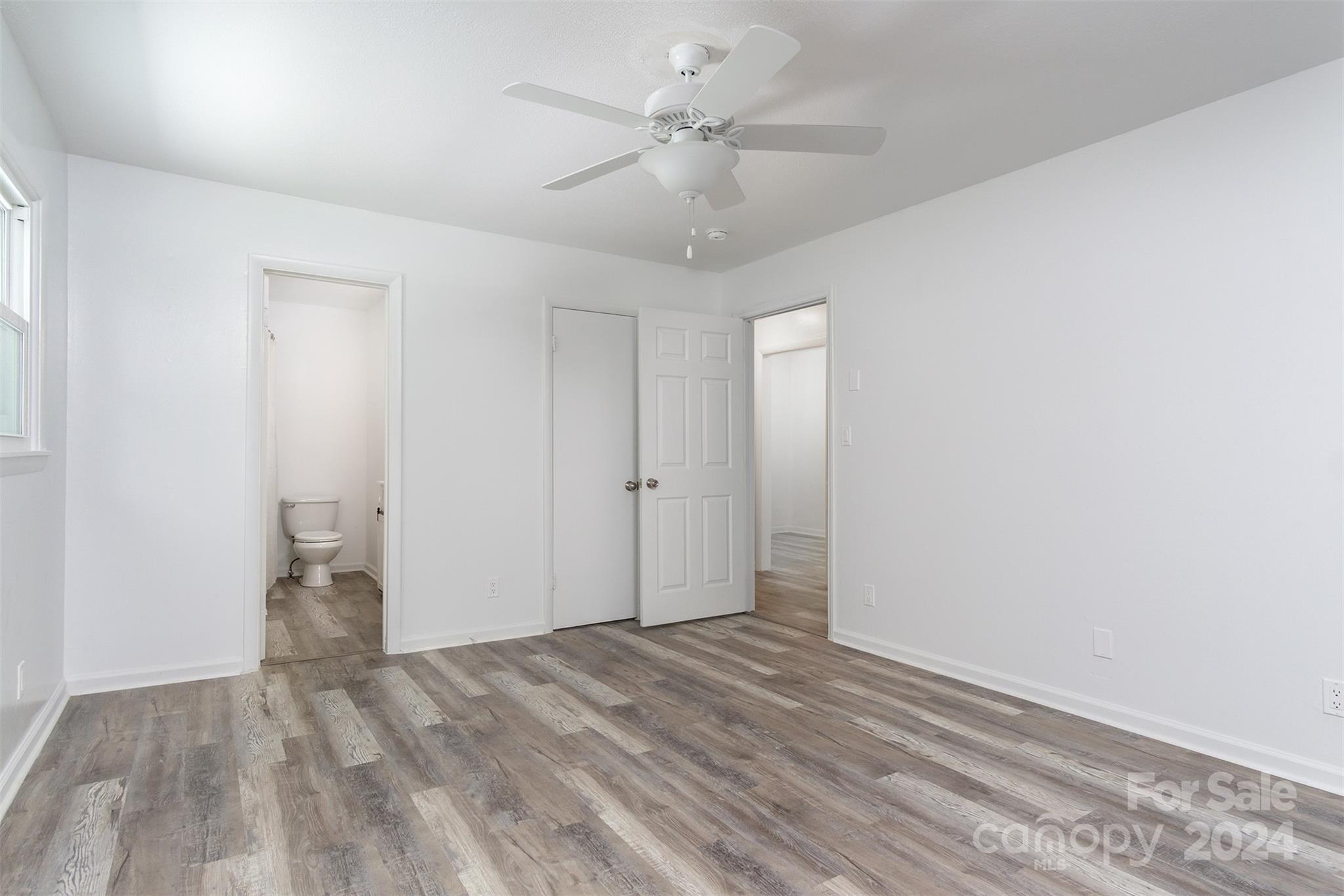 468 Deer Park Lake Road Spruce Pine, NC 28777 - Photo 15 of 46 wooden floor in an empty room