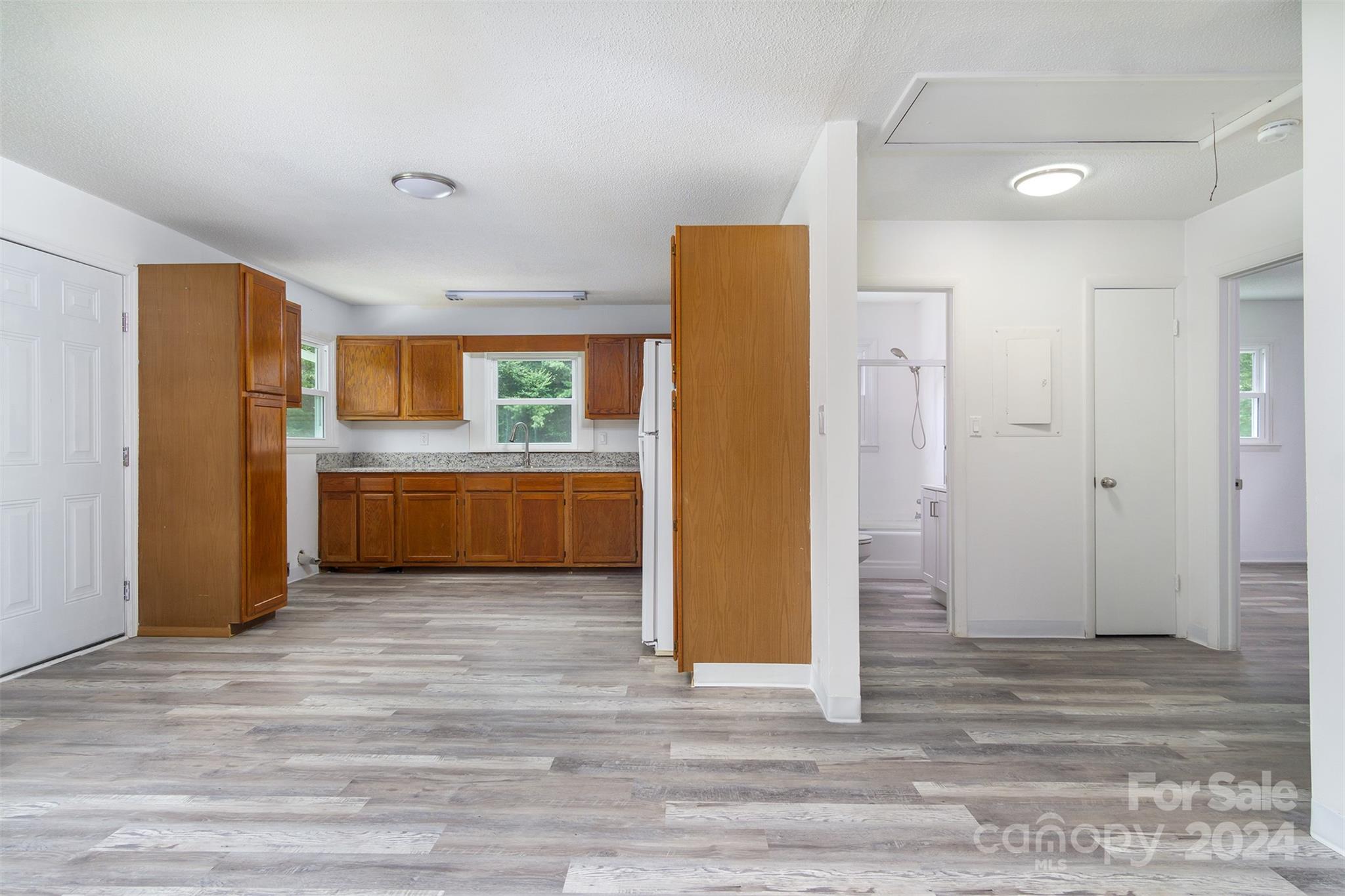 468 Deer Park Lake Road Spruce Pine, NC 28777 - Photo 17 of 46 a view of a kitchen with a refrigerator and a sink