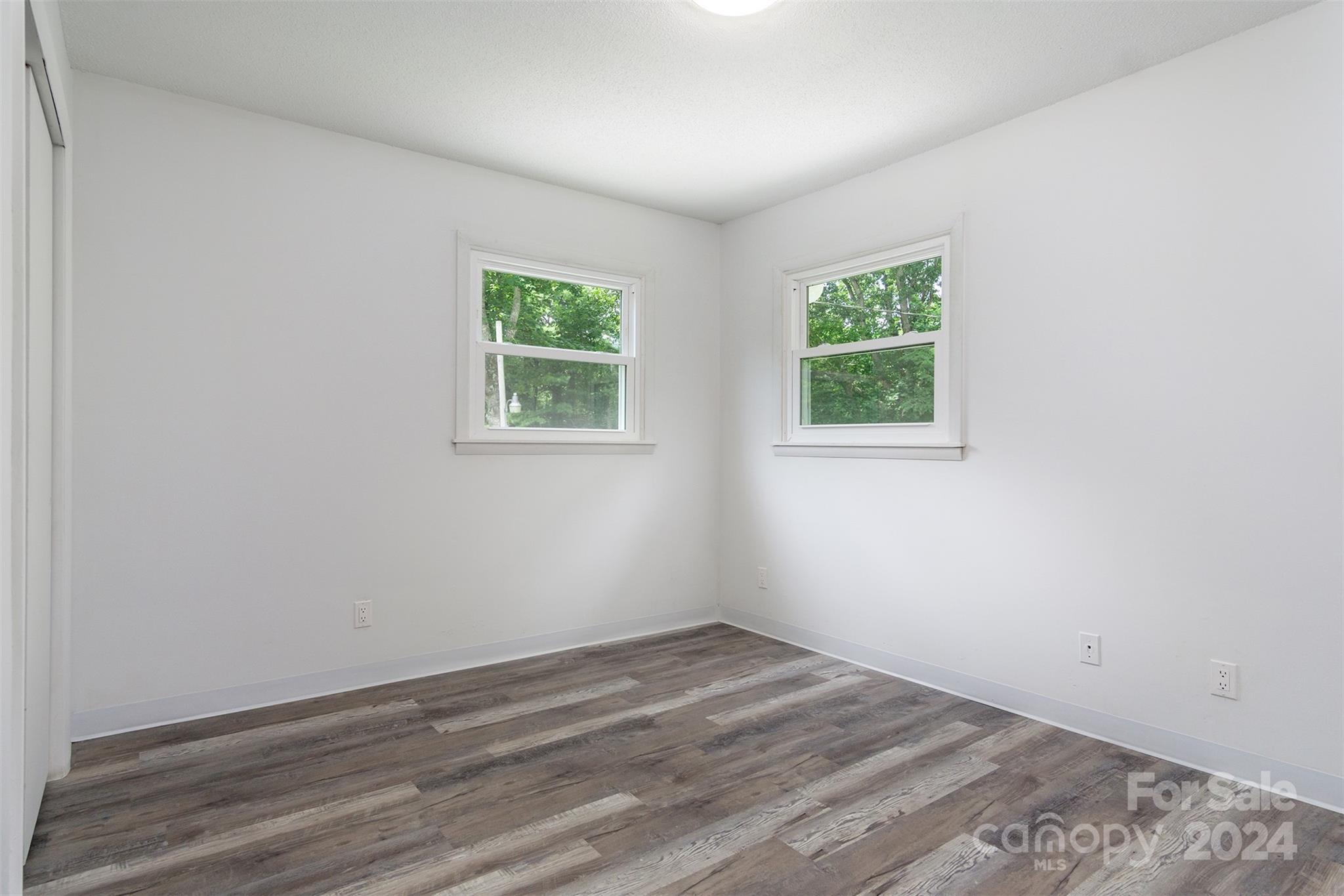 468 Deer Park Lake Road Spruce Pine, NC 28777 - Photo 22 of 46 an empty room with a window