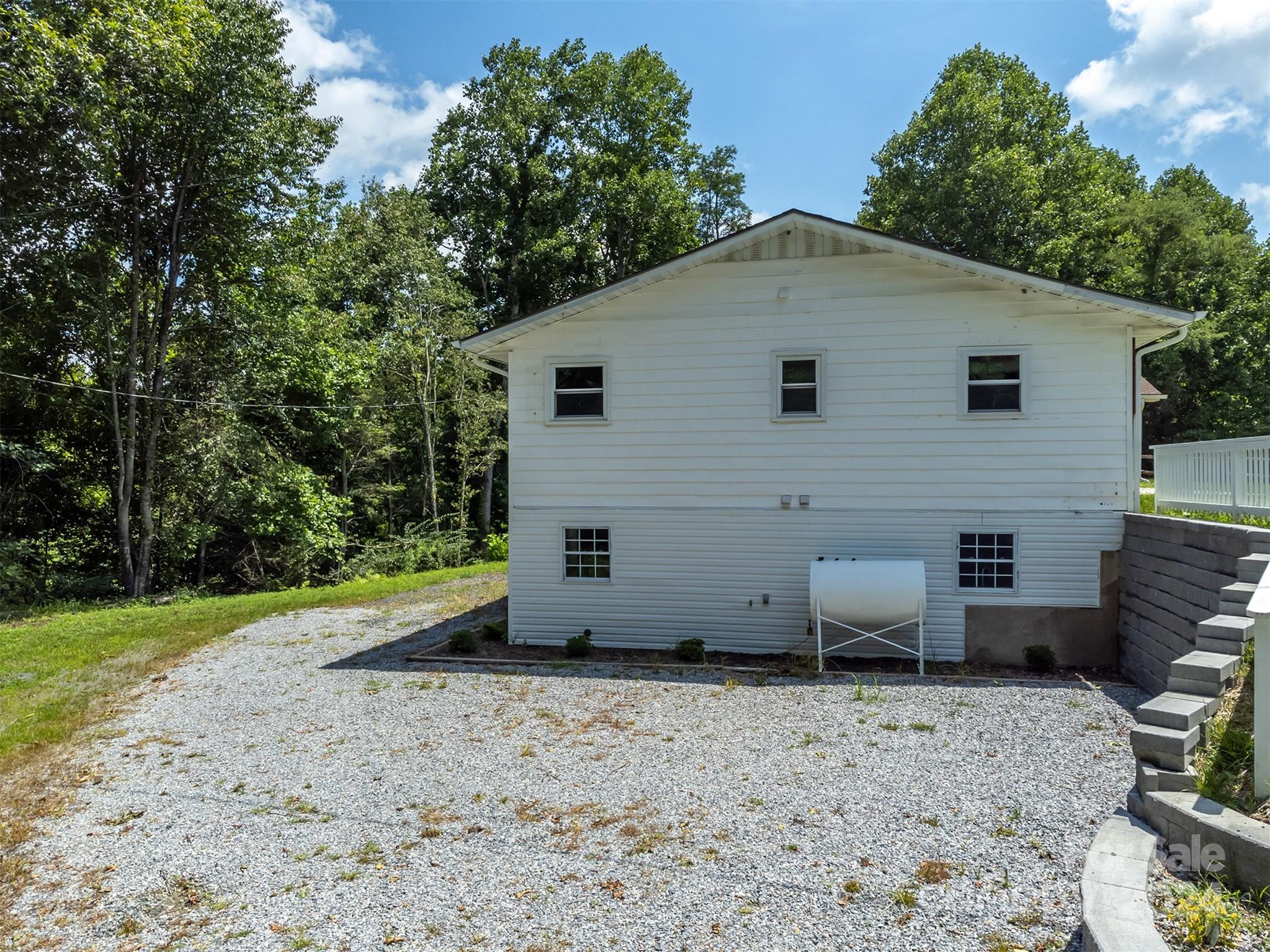 468 Deer Park Lake Road Spruce Pine, NC 28777 - Photo 26 of 46 a view of a backyard