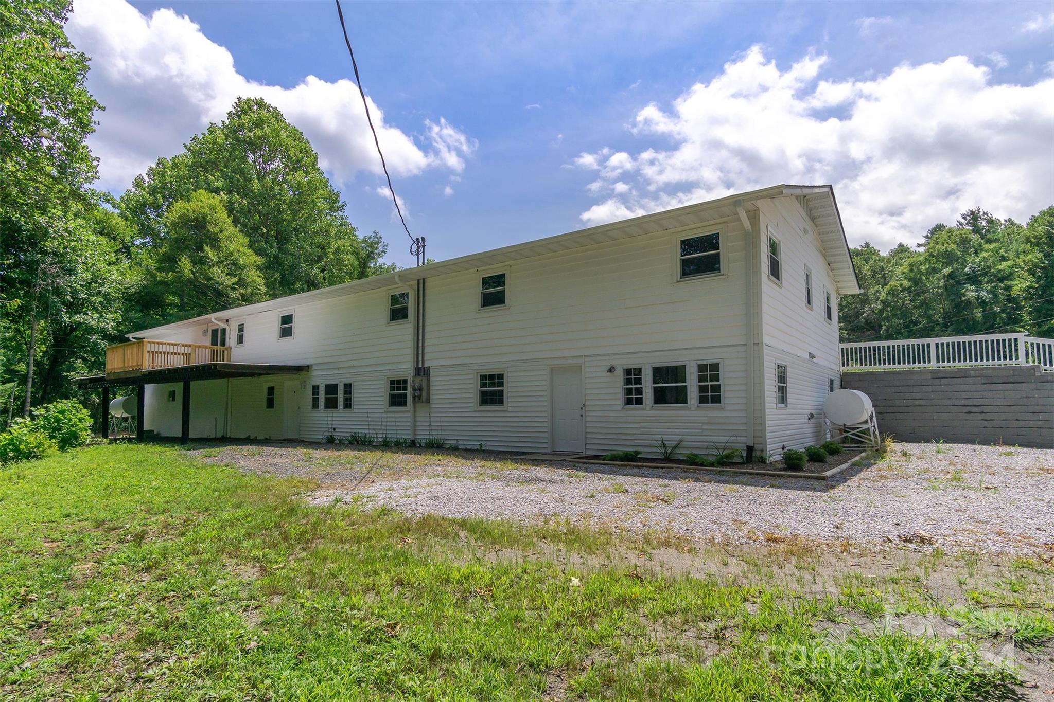 468 Deer Park Lake Road Spruce Pine, NC 28777 - Photo 28 of 46 a house view with a backyard space