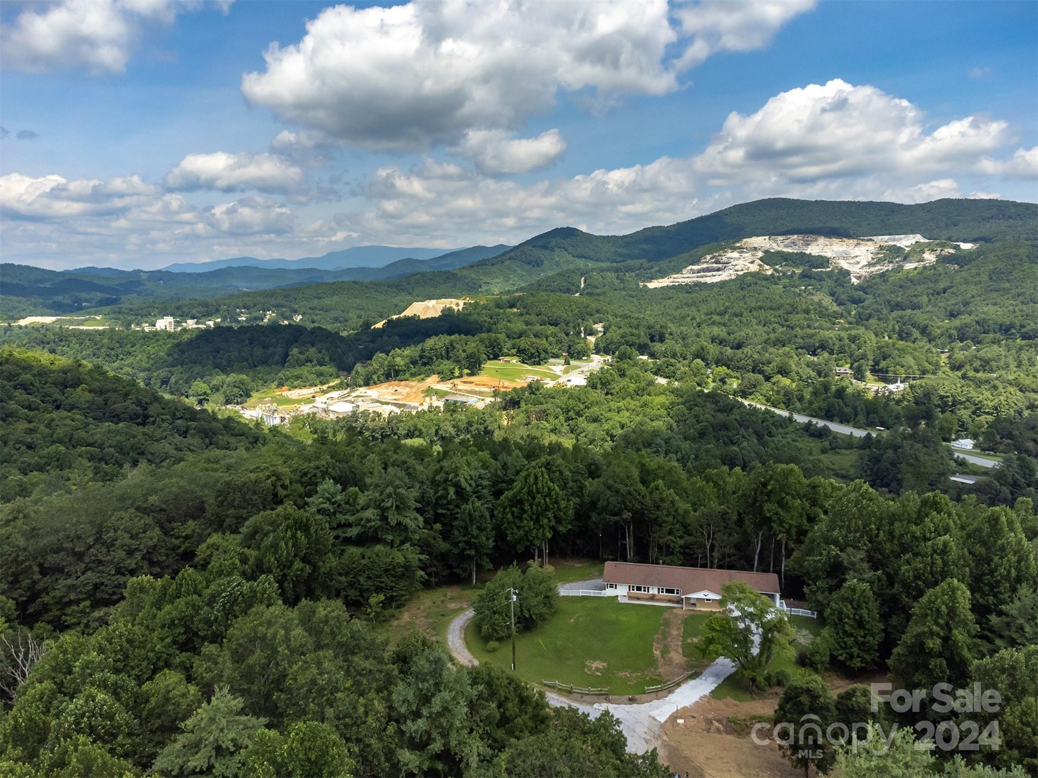 468 Deer Park Lake Road Spruce Pine, NC 28777 - Photo 30 of 46 a view of a lake