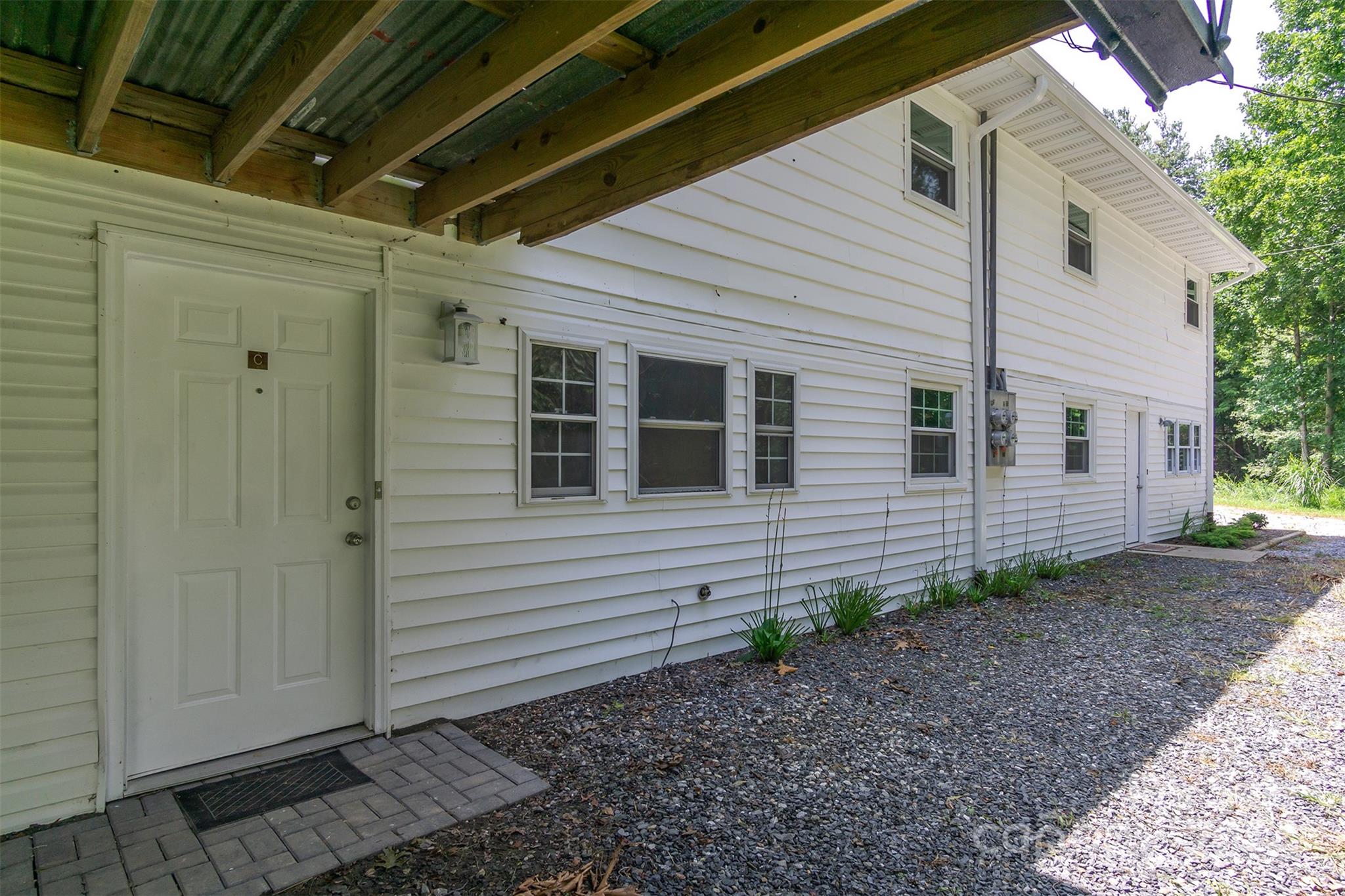 468 Deer Park Lake Road Spruce Pine, NC 28777 - Photo 35 of 46 a view of a house with a backyard