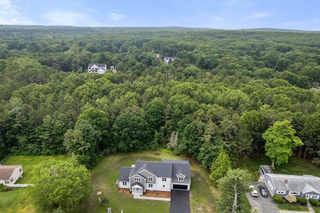 32 Deerfield Road Sharon, MA 02067 - Photo 29 of 32 an aerial view of a house with a yard