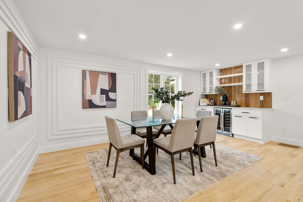 32 Deerfield Road Sharon, MA 02067 - Photo 9 of 32 a view of a dining room with furniture and wooden floor