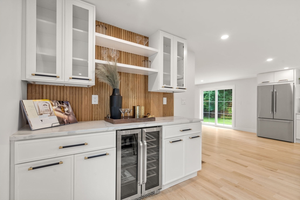 32 Deerfield Road Sharon, MA 02067 - Photo 10 of 32 a kitchen with a stove and a wooden floor