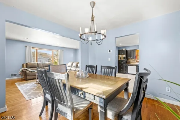 a bathroom with a sink toilet and mirror
