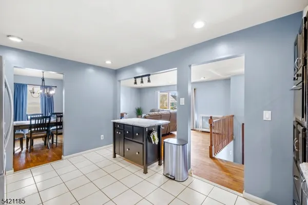 a view of a workspace with furniture and a chair