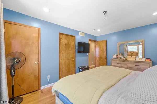 a aerial view of a house with a yard