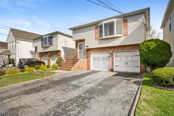 a view of a stairs and wooden floor