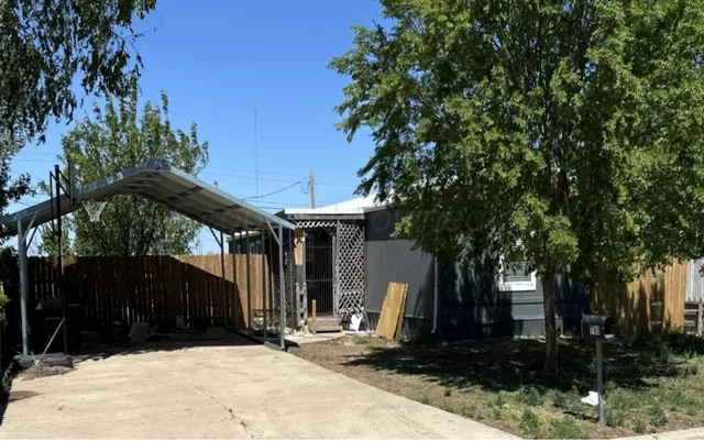 a view of a black and white house