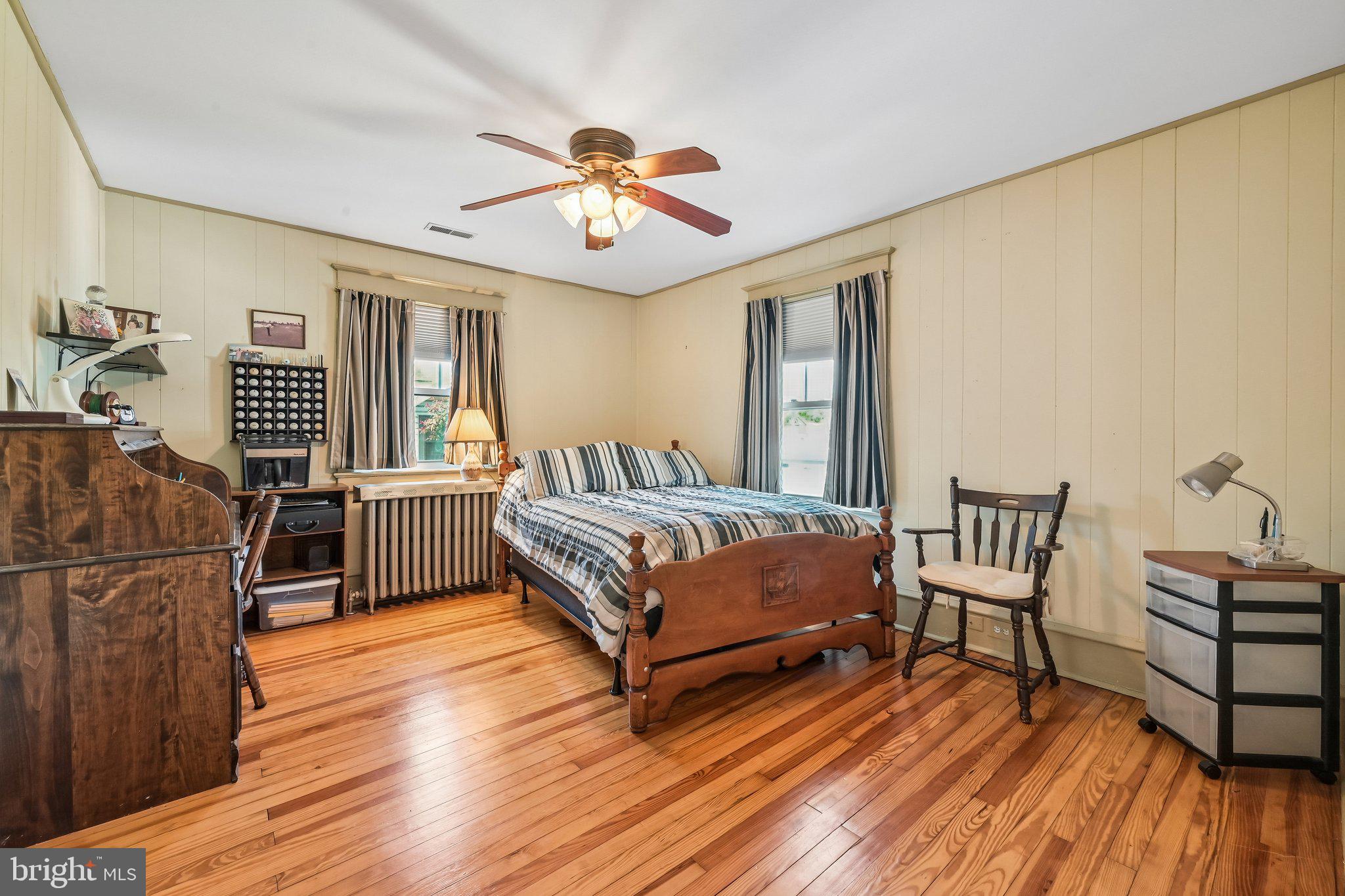 147 Hawthorne Avenue Haddonfield, NJ 08033 - Photo 18 of 25 Cozy bedroom with warm wooden accents.