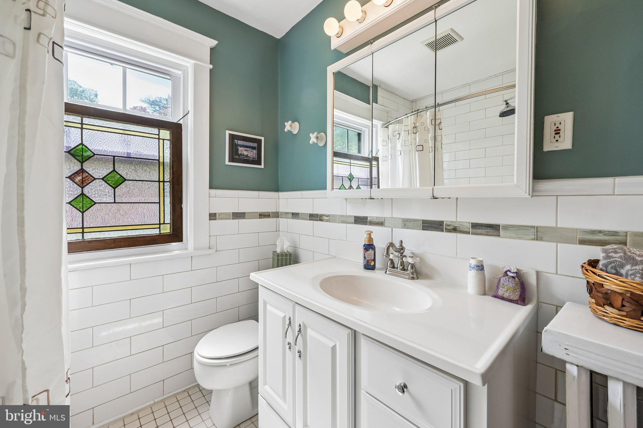 147 Hawthorne Avenue Haddonfield, NJ 08033 - Photo 19 of 25 Charming bathroom with stained glass accents.