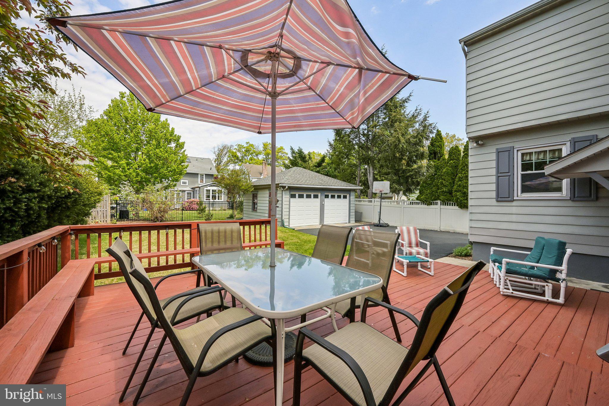 147 Hawthorne Avenue Haddonfield, NJ 08033 - Photo 23 of 25 Sunny deck with vibrant umbrella.
