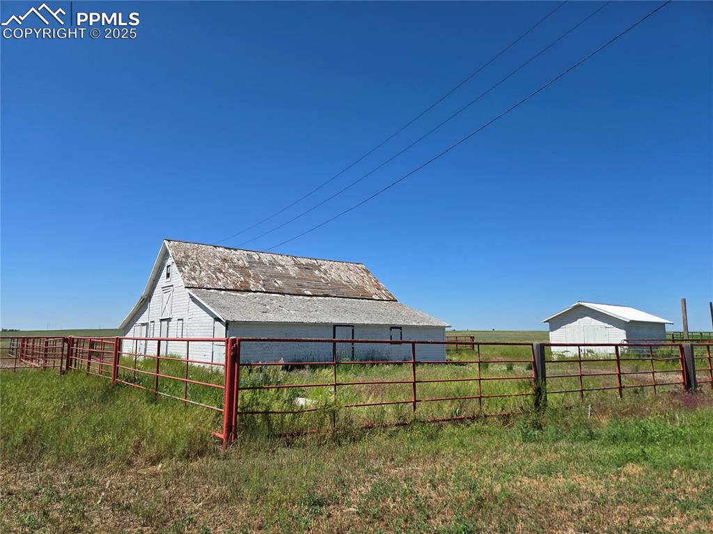 12350 Holtwood Road Simla, CO 80835 - Photo 4 of 34 a view of a house with a yard