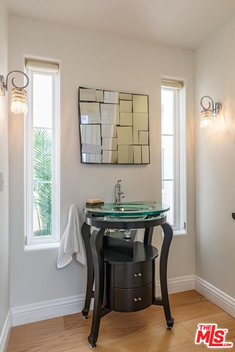 6438 Lunita Road Malibu, CA 90265 - Photo 15 of 34 a view of a workspace with furniture and a window