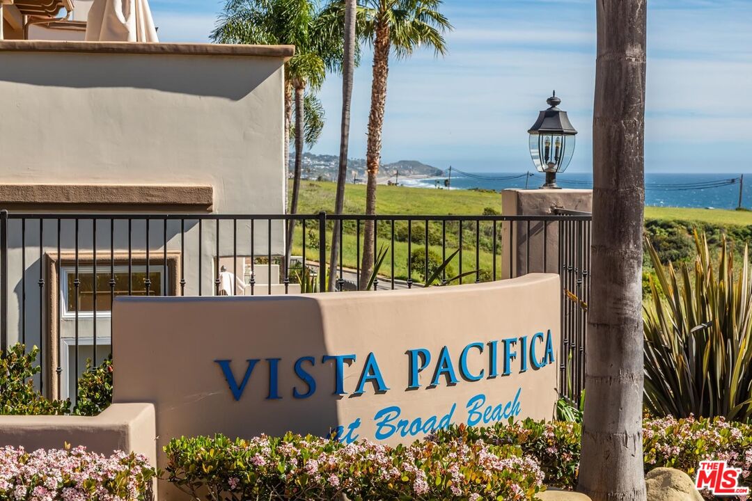 6438 Lunita Road Malibu, CA 90265 - Photo 22 of 34 a street sign on a table next to a road
