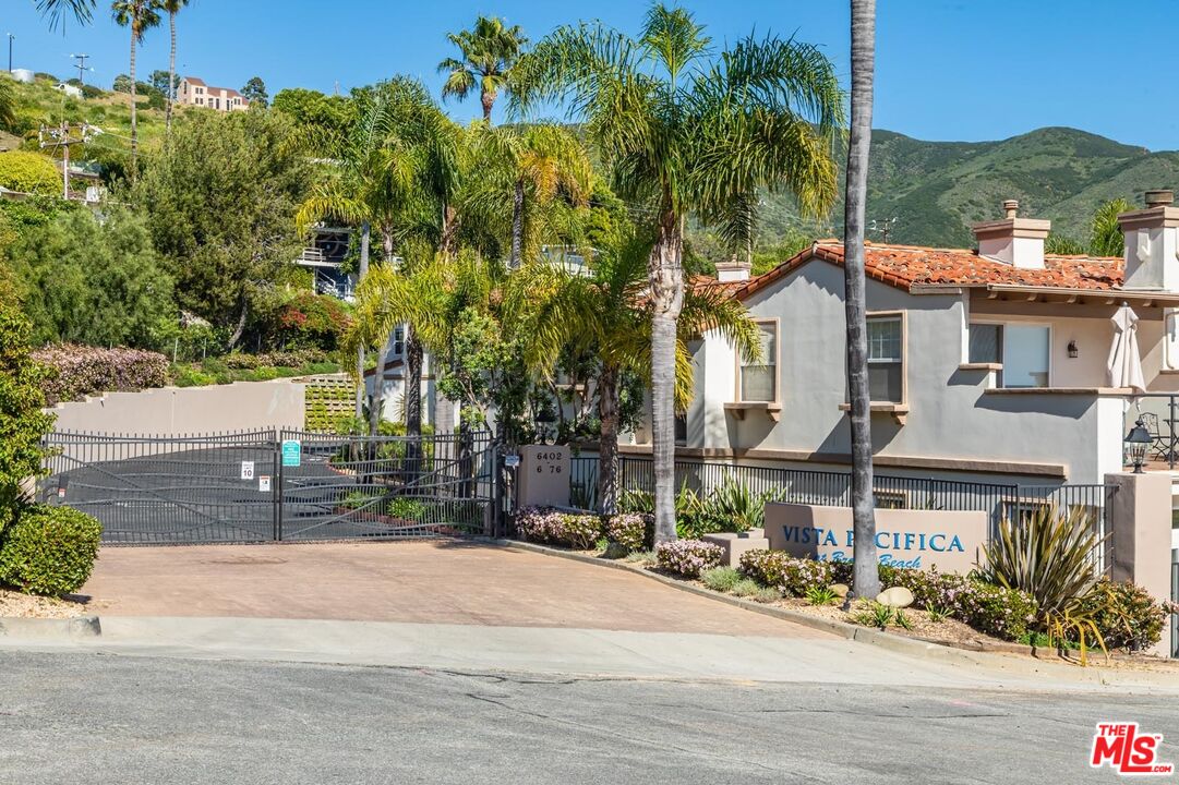 6438 Lunita Road Malibu, CA 90265 - Photo 23 of 34 front view of a house with a street