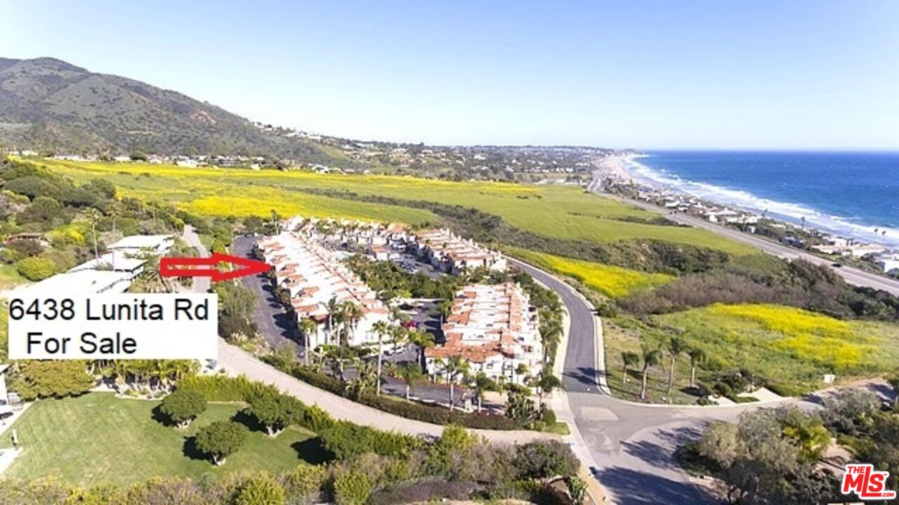6438 Lunita Road Malibu, CA 90265 - Photo 4 of 34 a view of an ocean and a mountain