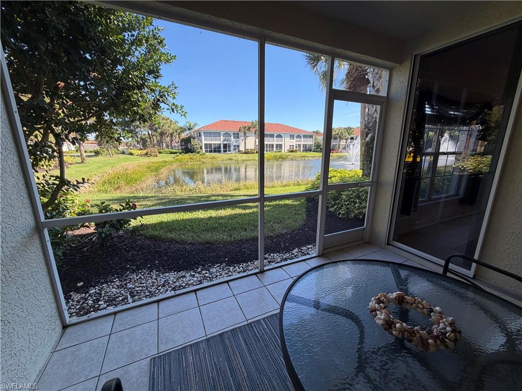 23810 Marbella Bay Road, Unit 102 Estero, FL 34135 - Photo 26 of 26 a living room with a couch