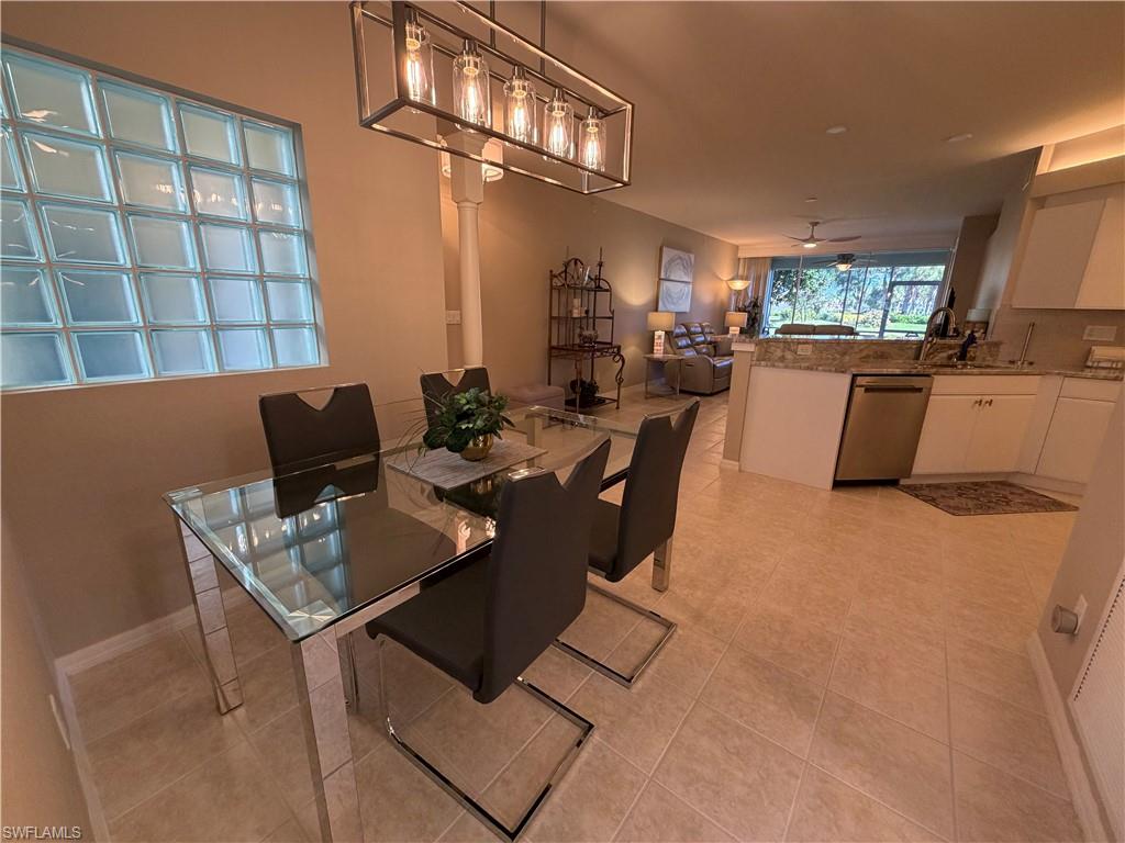 23810 Marbella Bay Road, Unit 102 Estero, FL 34135 - Photo 10 of 26 a living room with furniture