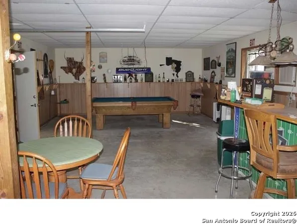 a dining room with lots of tables and chairs