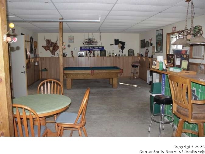 317 Swayze Road Utopia, TX 78884 - Photo 5 of 10 a dining room with lots of tables and chairs